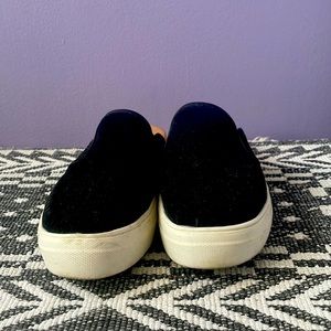 Black slip on sneakers